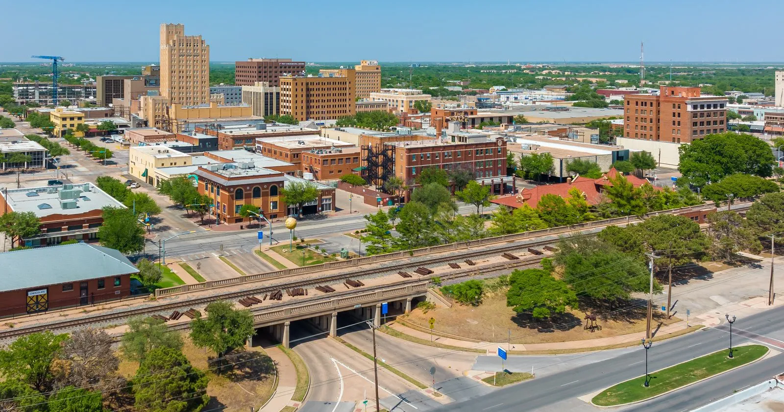 Aerial view of downtown Abilene, Texas, with the rail line in the foreground