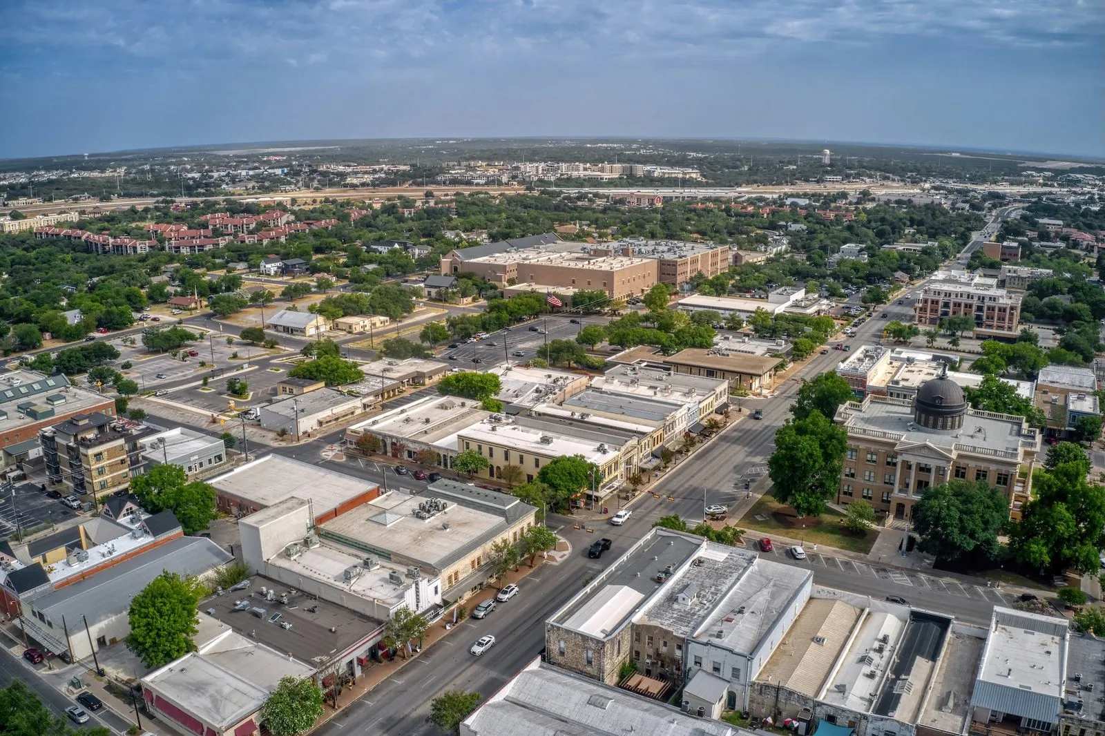 Aerial view of downtown Georgetown, Texas, with the Williamson County Courthouse on the square